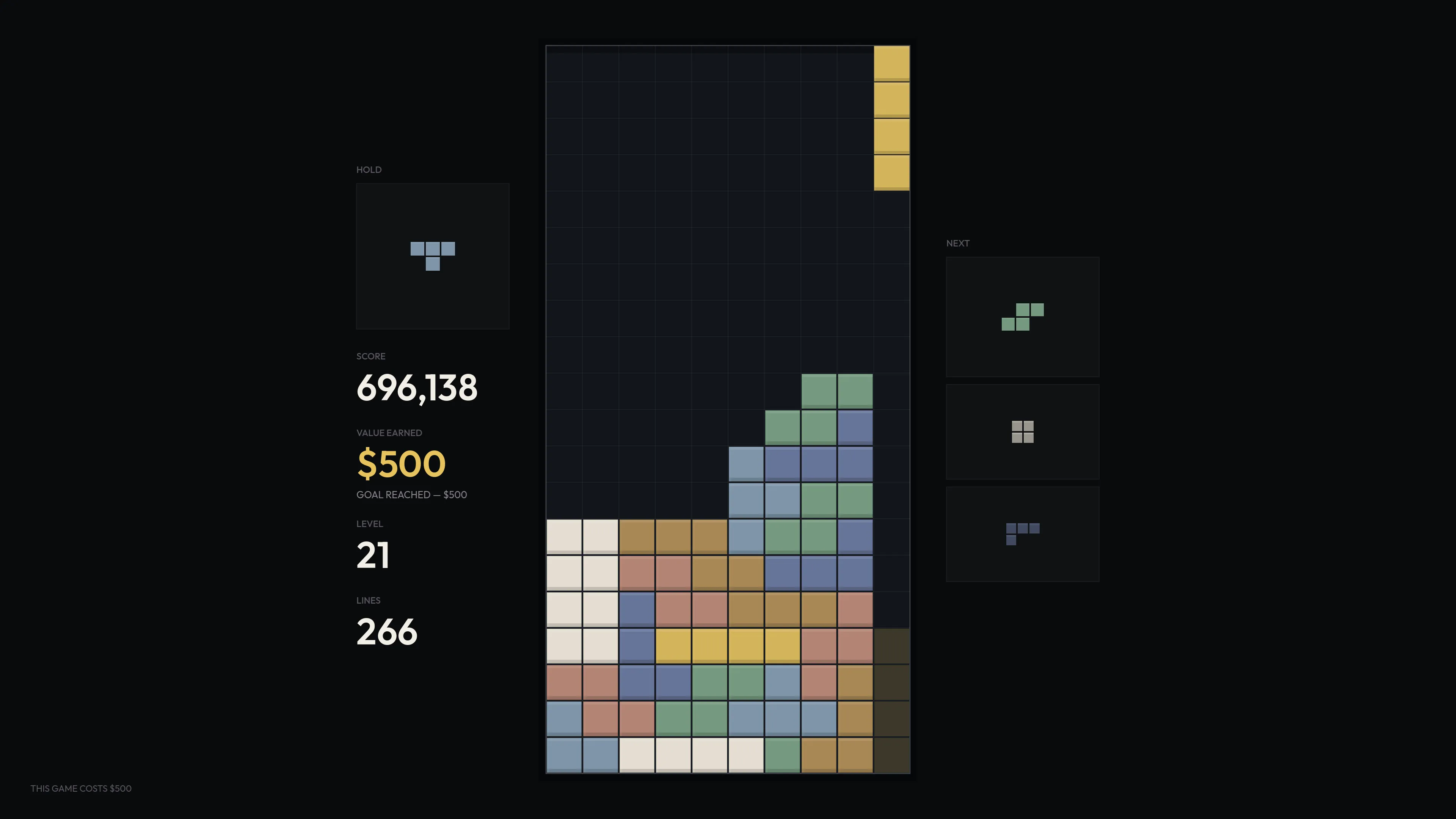 Real gameplay at level 21: a tall stack on one side of the board, VALUE at $500.